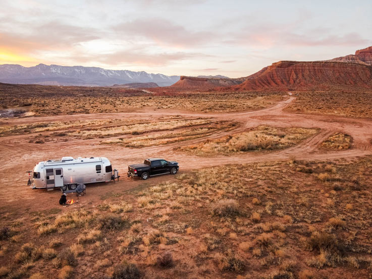 aerial view of an Airstream boondocking in the desert