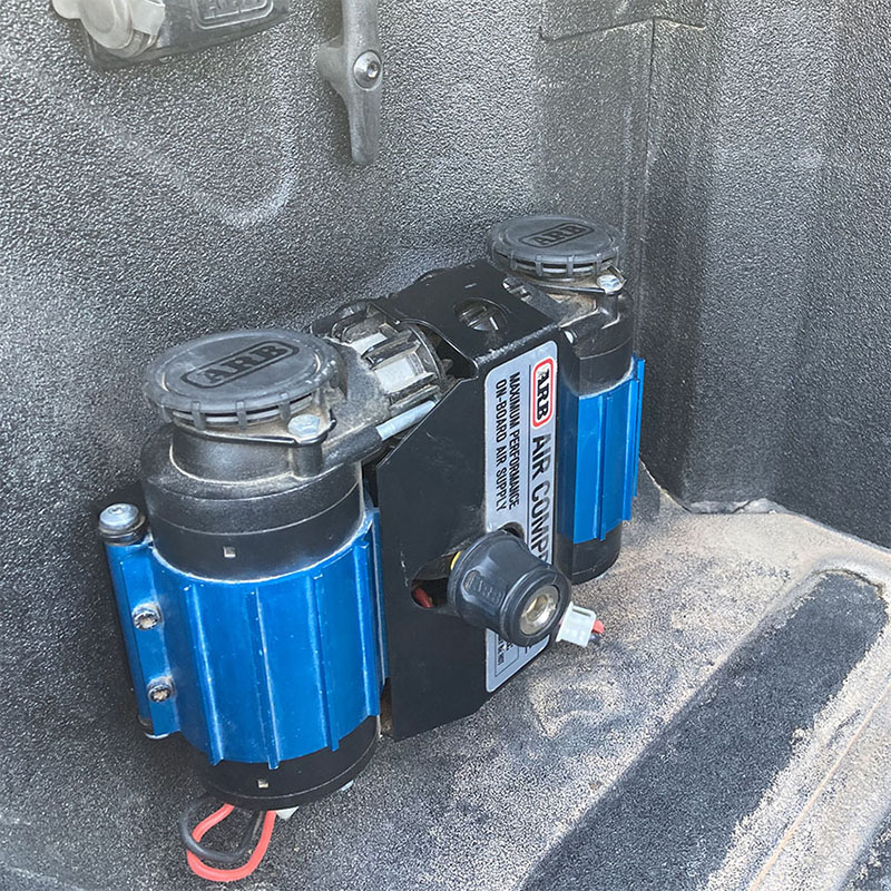 air compressor in bed of truck