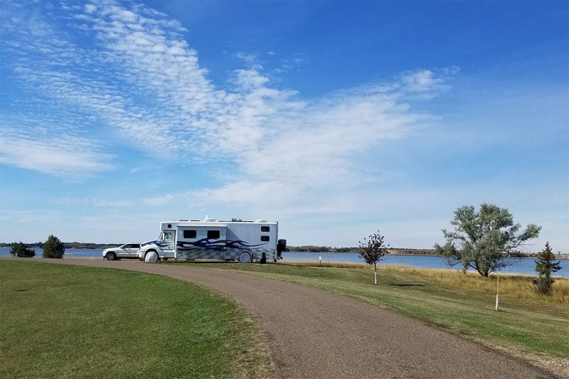 RV with a water-view campsite in North Dakota State Park