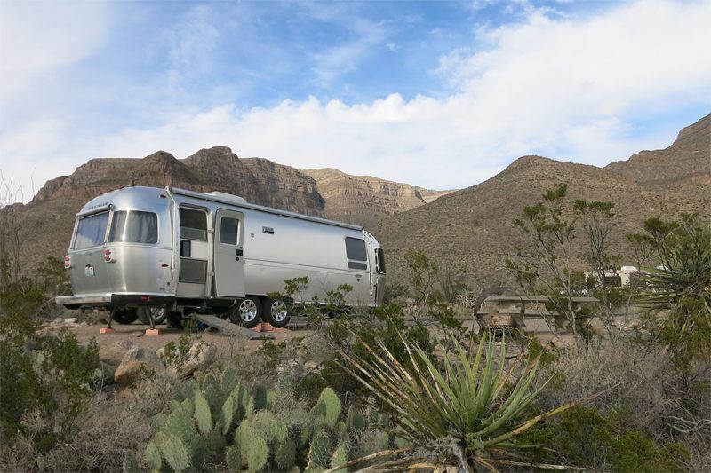 An Airstream camping in a state park in New Mexico
