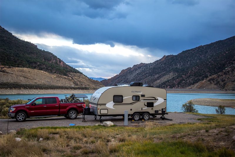 A travel trailer camping at a state park in Colorado