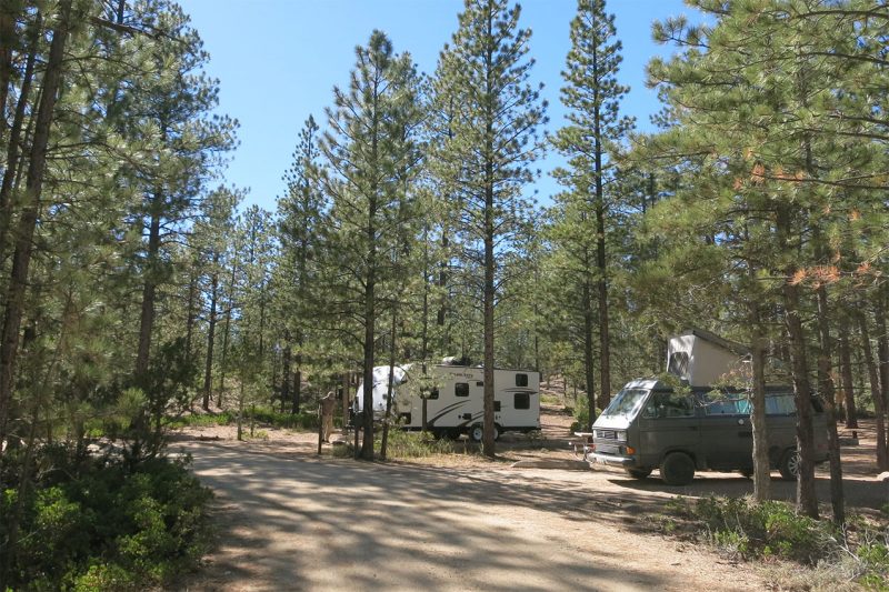 A van and a travel trailer camping at Bryce Canyon