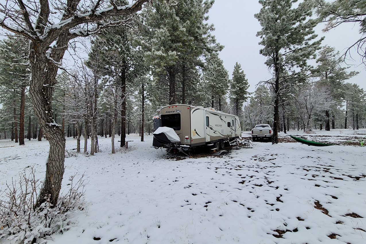 RV boondocked in the snow.