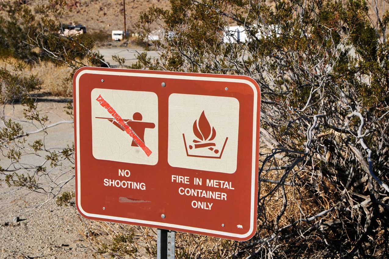 No shooting and campfire park sign.