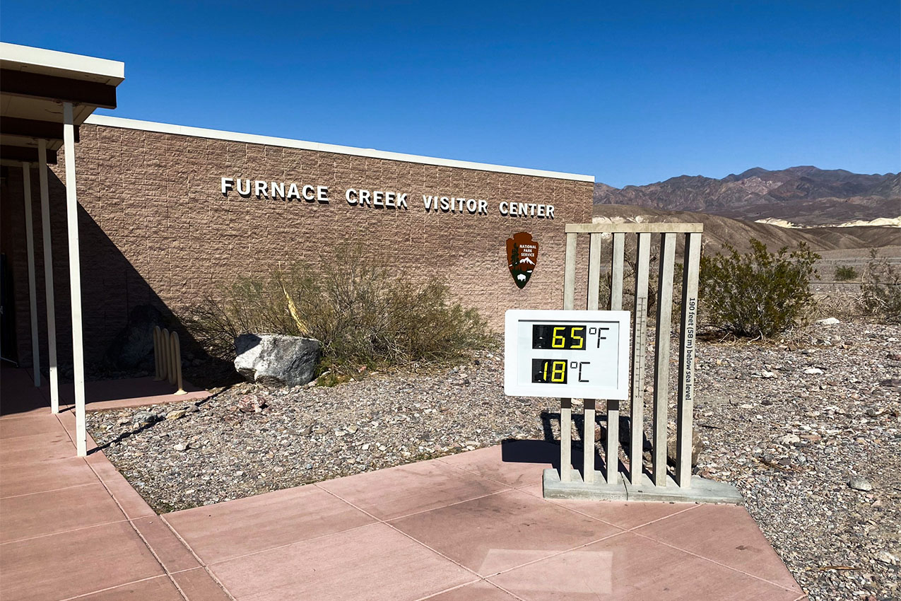 Large digital temperature display outside Death Valley visitor Center.