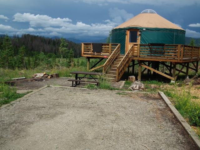 Yurt built on a platform with gravel site located in front