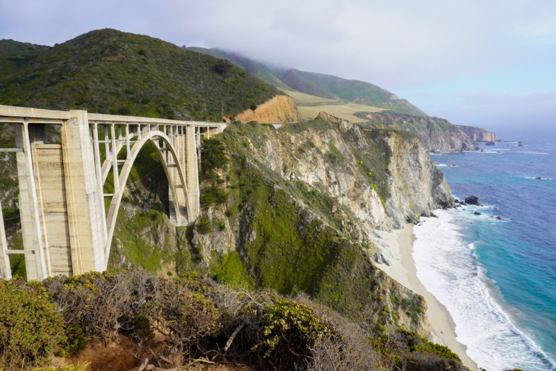 Bridge over cliffs on coastline overlook ocean