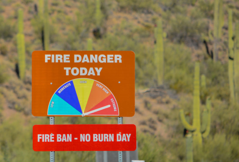 Fire danger and fire ban signage at a park in Arizona.