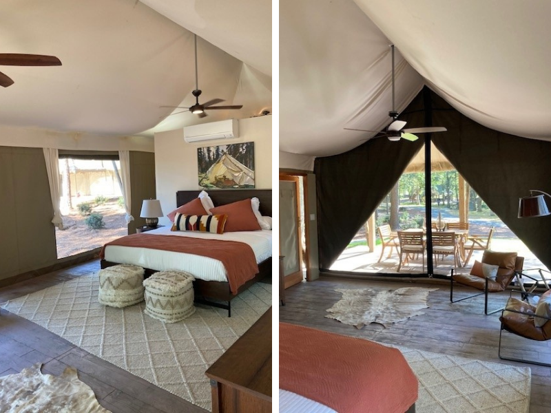 Interior of a glamping tent with a bed, ceiling fan, bedroom furniture and a rug.