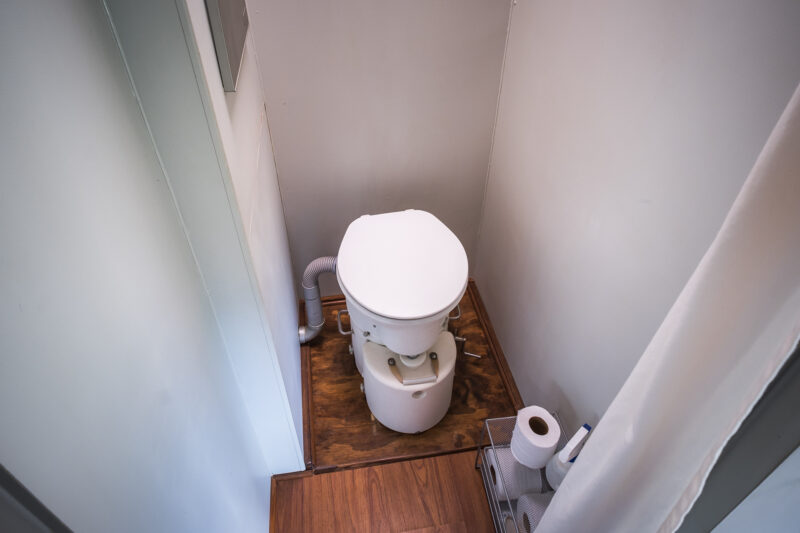 An Airhead composting toilet in an RV