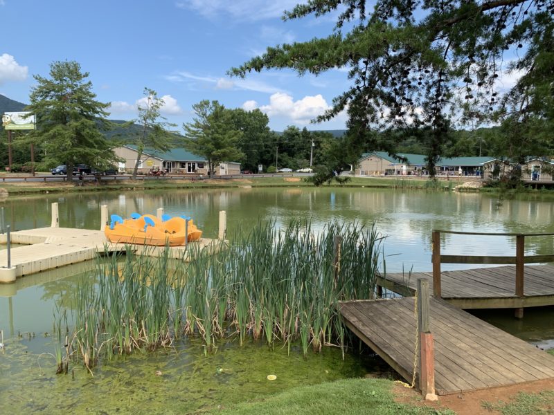 a campground surrounding a lake