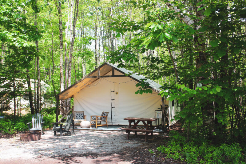 Safari style glamping tent in woods at campground