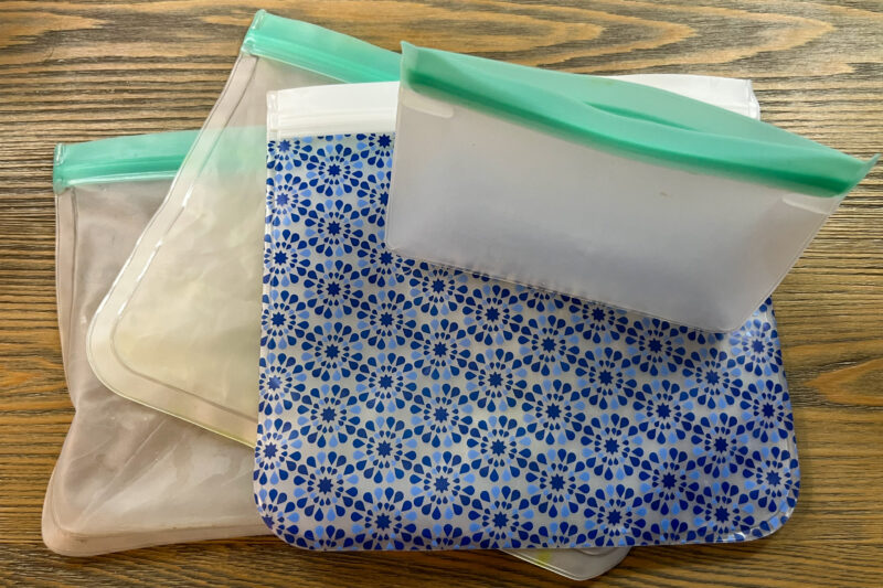 Stack of four silicone reusable ziptop sandwich bags