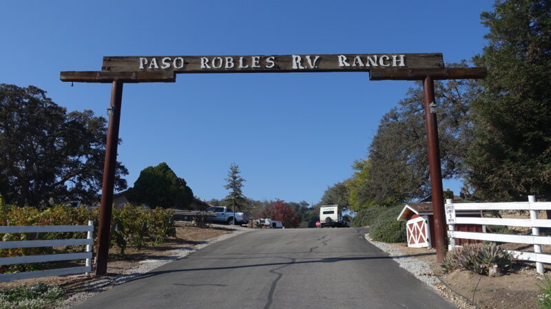 a wooden entrance sign for paso robles rv ranch
