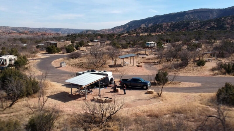 an aerial view of a campground in the desert