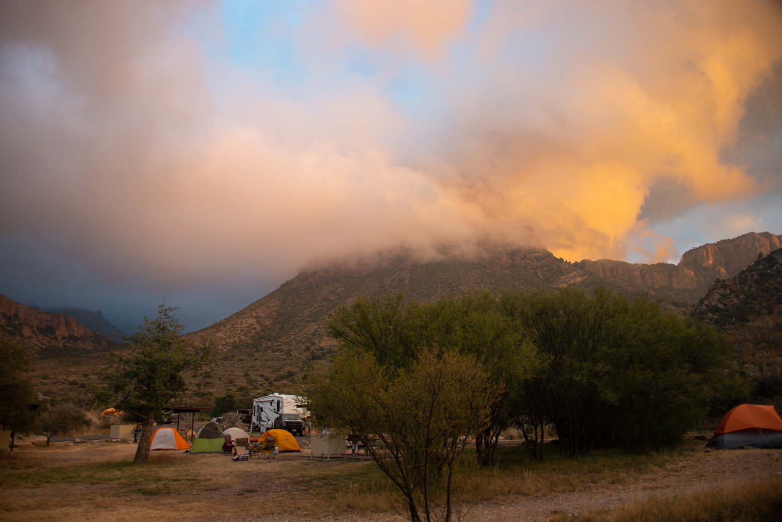 RVs and tents set up camp beside Texas' Big Bend National Park
