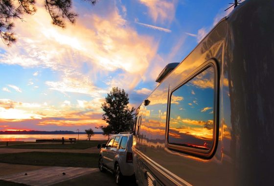Sunset and clouds reflected in the window of RV windows.